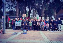 Archena calienta motores para el 8M visibilizando la resistencia de las mujeres palestinas que luchan bajo las bombas Medio centenar de vecinas y vecinos han salido a la Plaza 1º de Mayo de Archena para solidarizarse con las mujeres palestinas | IU-Verdes Archena