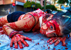 Imagen de archivo de una activista antitaurina durante una performance frente a la plaza de toros de Murcia para denunciar el sufrimiento y la muerte de los animales utilizados en los festejos taurinos en 2024 | Foto.- Dominic D. Skerrett